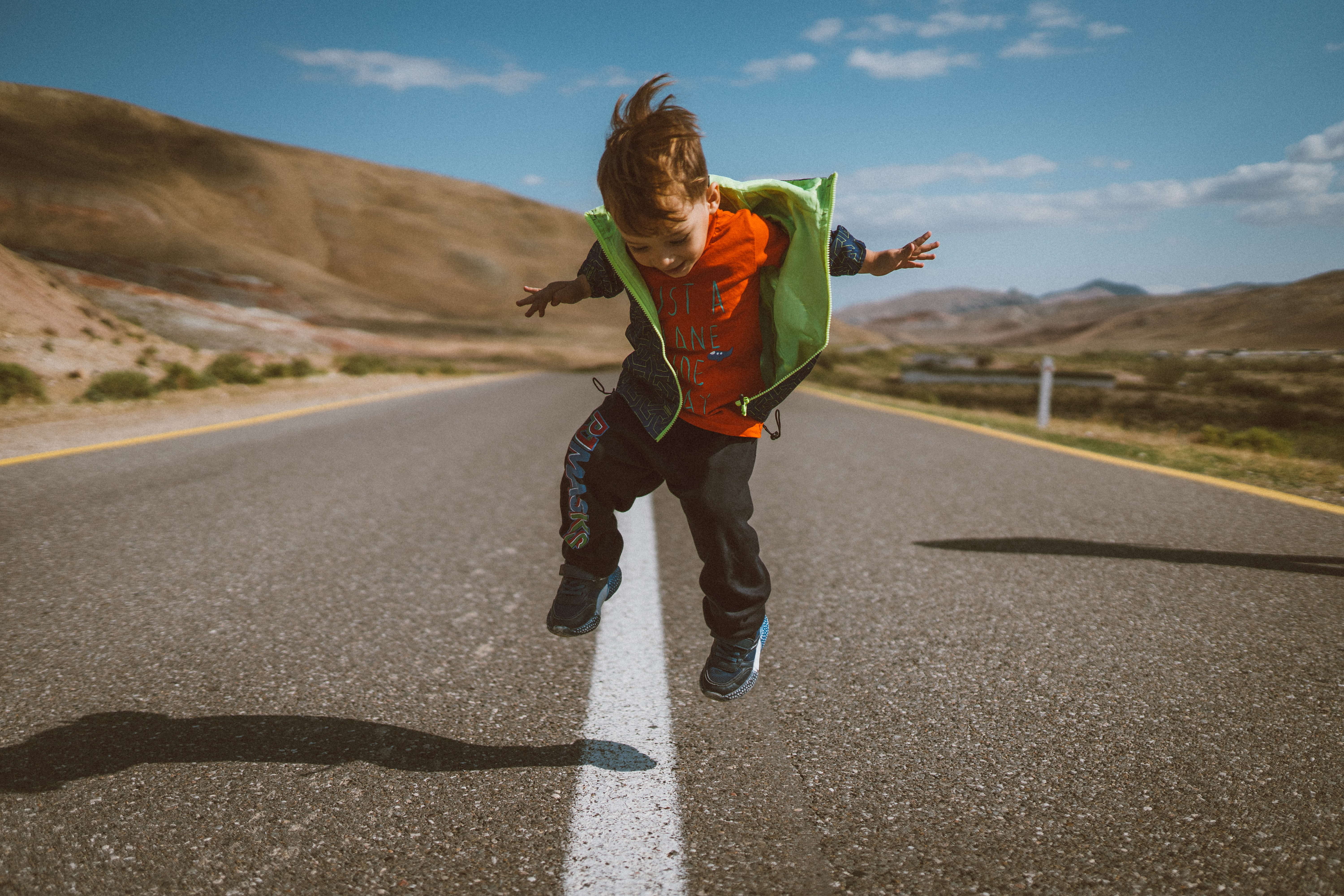 Image of a child playing outside